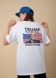This captivating image showcases a woman confidently sporting a white shirt with a Trump-themed design on the back. The shirt features a picture of Donald Trump himself along with the powerful words "Trump was right about everything.". Get yours now! Support Trump this year.